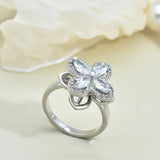 Rotatable Titanium Steel Four-petal Flower Necklace Female Inlaid Zircon Ring Earrings